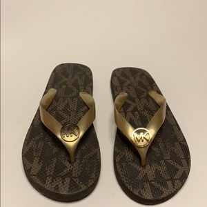 Used Michael kors flip flops
